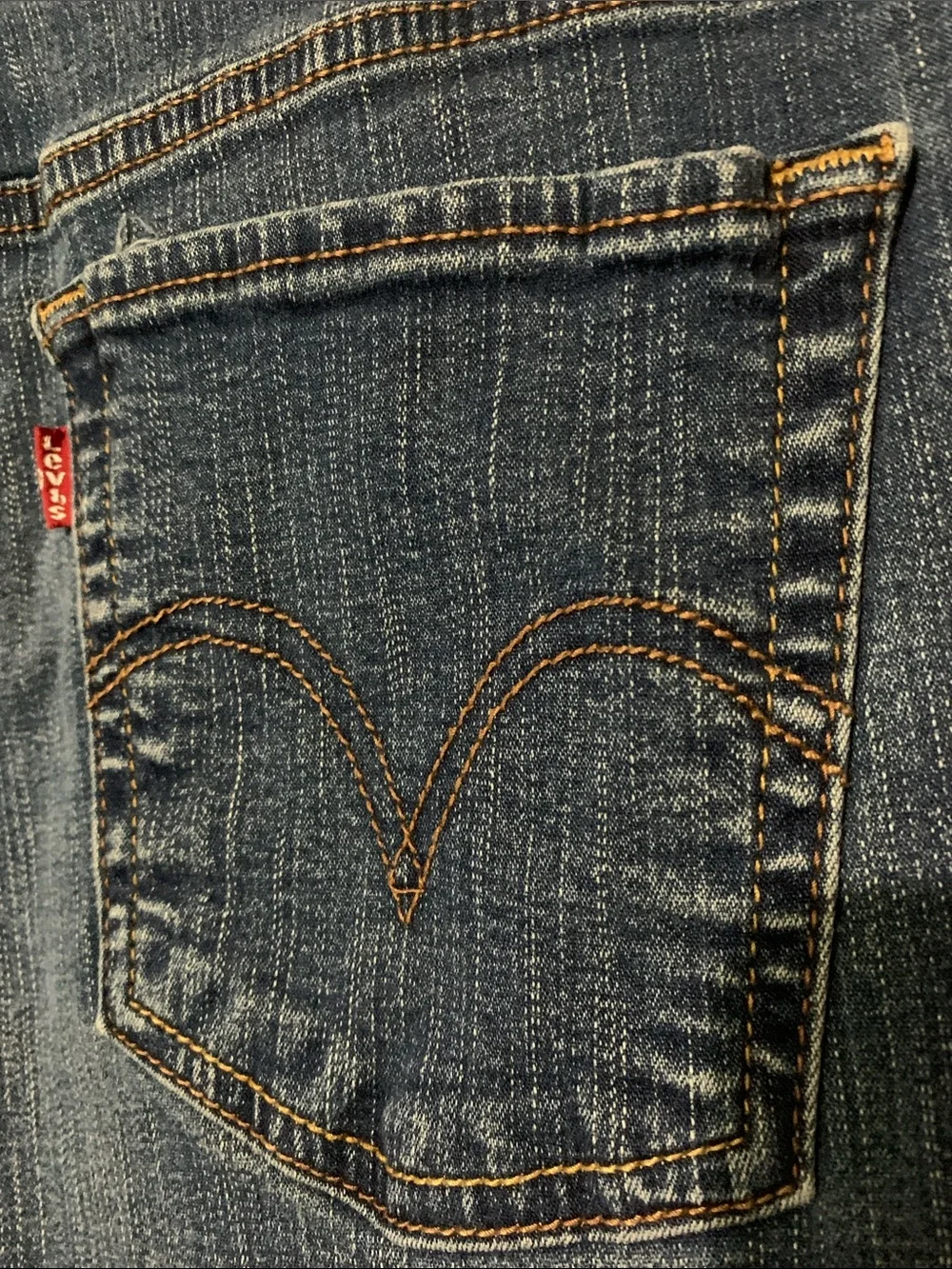 Levi's Classic Wide-Leg Jeans in Medium Blue Denim. 512 Bootcut